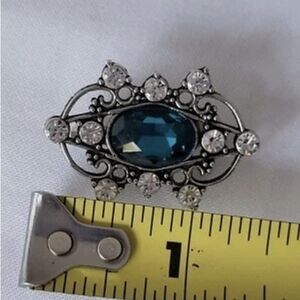 Elegant Silver and Blue Brooch